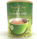 Green can of Royal Chai Cardamom Chai with a cup of tea on a white background